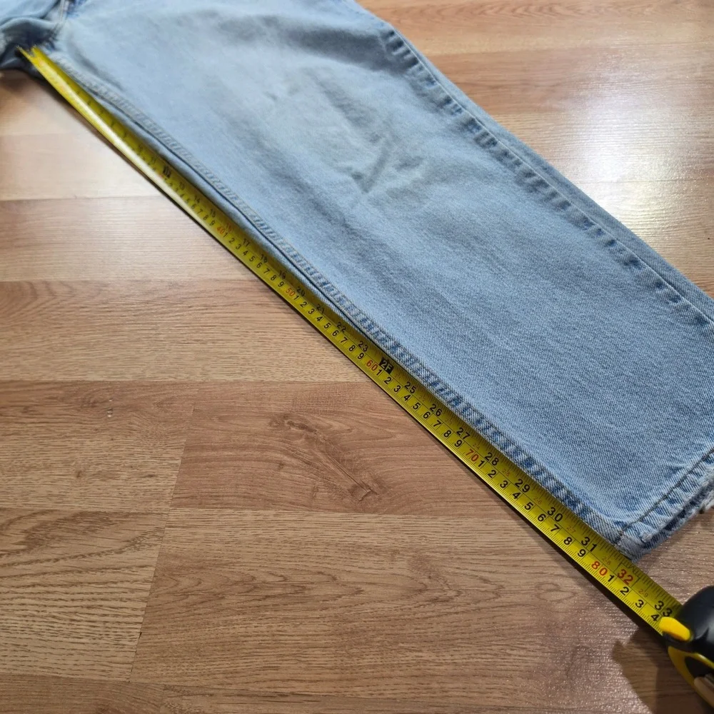 Vintage Levi's 560 Loose Fit Tapered Leg Jeans Mens 36x32 Light Wash Blue USA